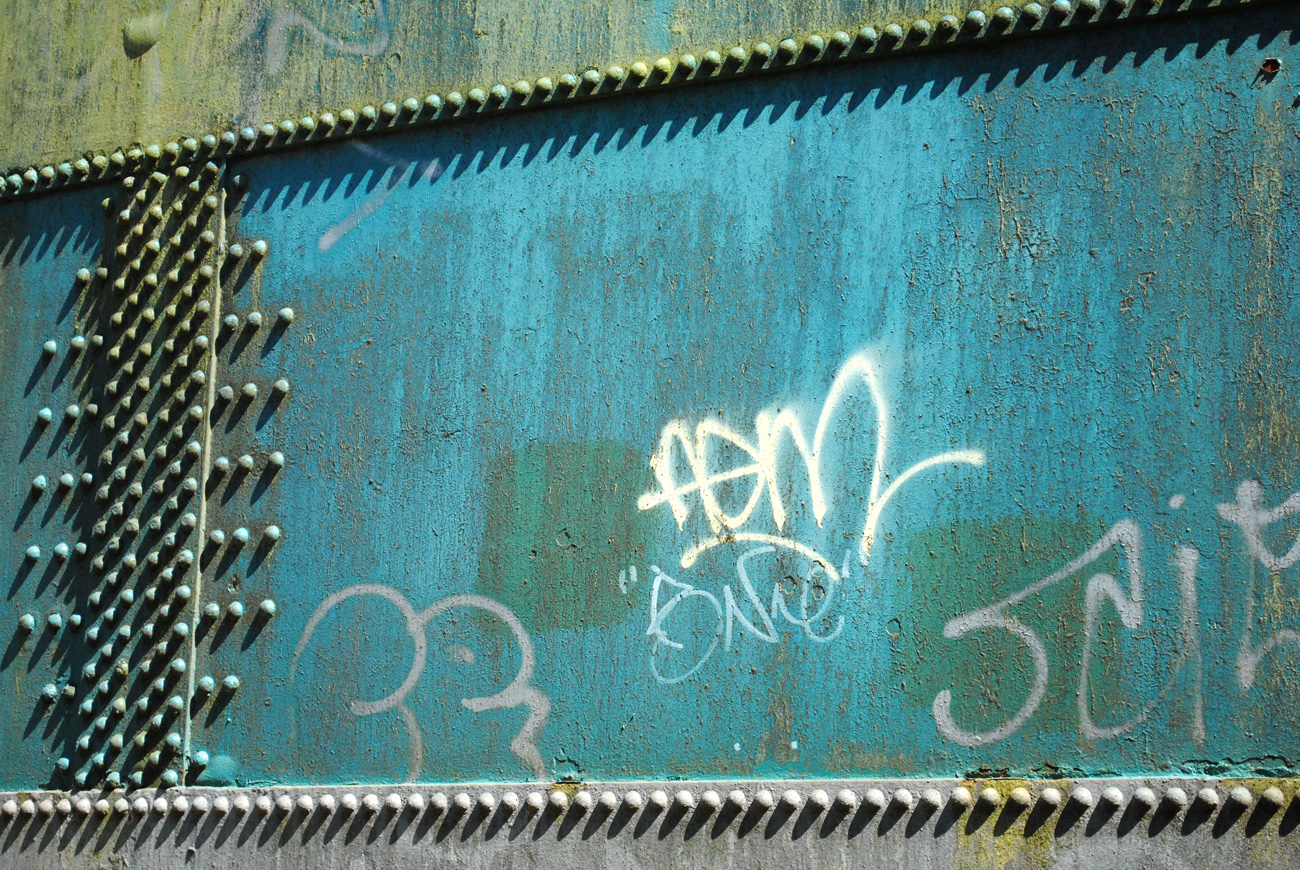 ICMSTUDIOS - A close up of one of the gas storage containers at the Tunbridge Wells gas works. There is some lovely colours coming off the rusty metal throughout the area.