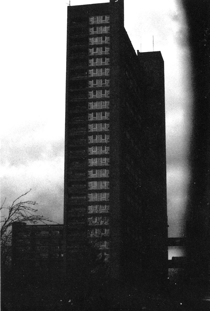 ICMSTUDIOS - A black and white photo of a tower block in London.